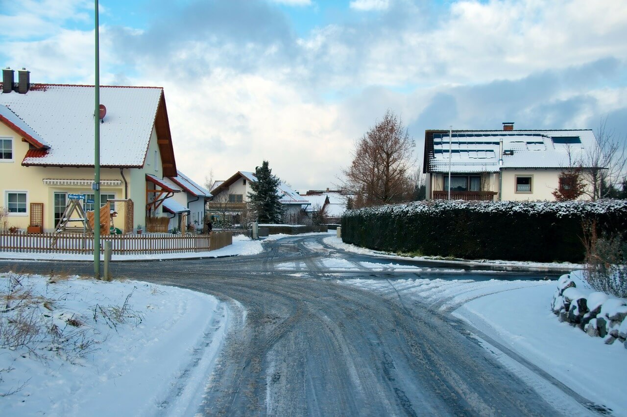 Houses on a snowy street.