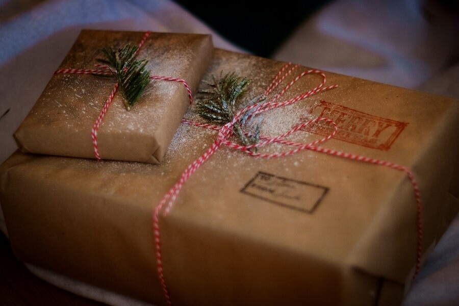 gifts wrapped in brown recycled paper