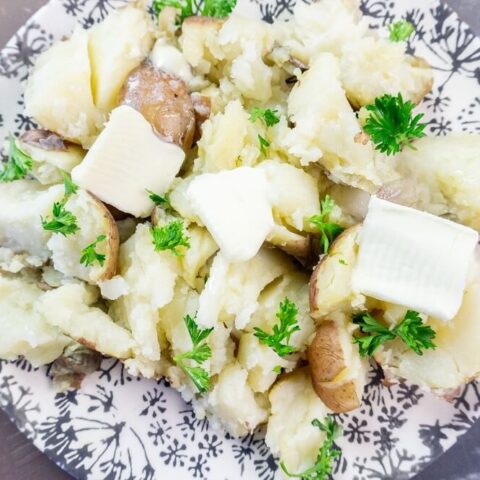 The Instant Pot Mashed potatoes on a plate ready for serving.