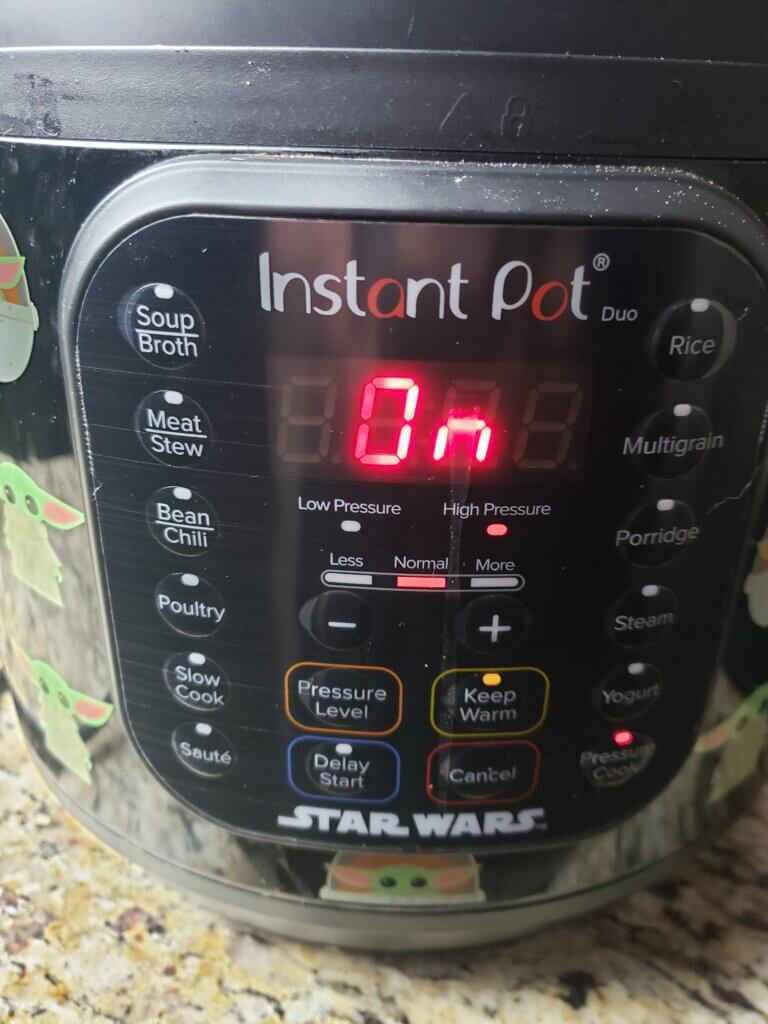 Sealed Instant Pot with timer set.